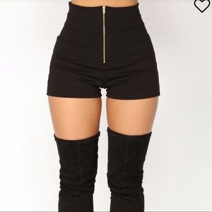 Black shorts with gold zipper